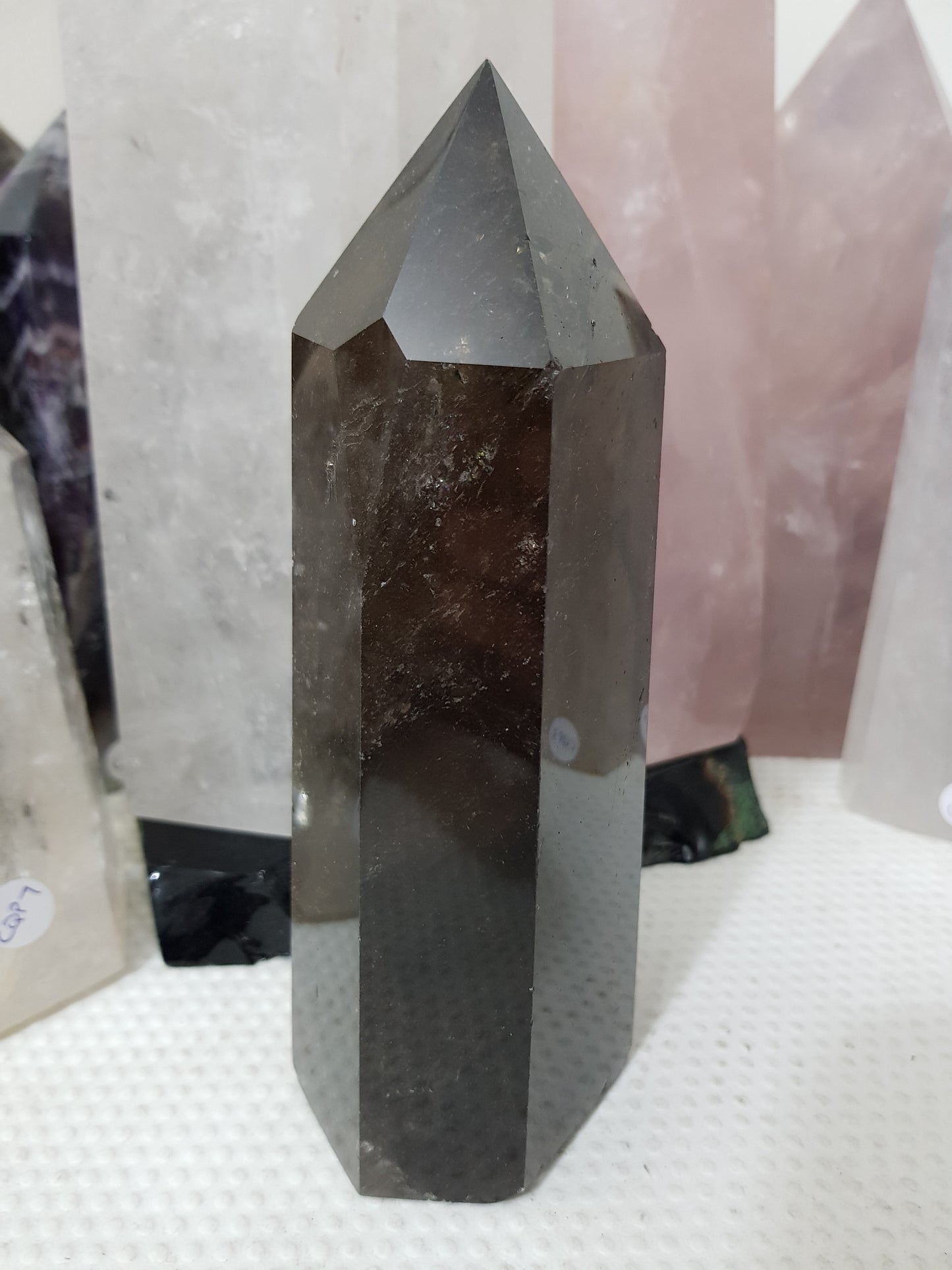Polished Brazilian Smoky Quartz crystal point tower. Smoky brown standing crystal point 17.5cm