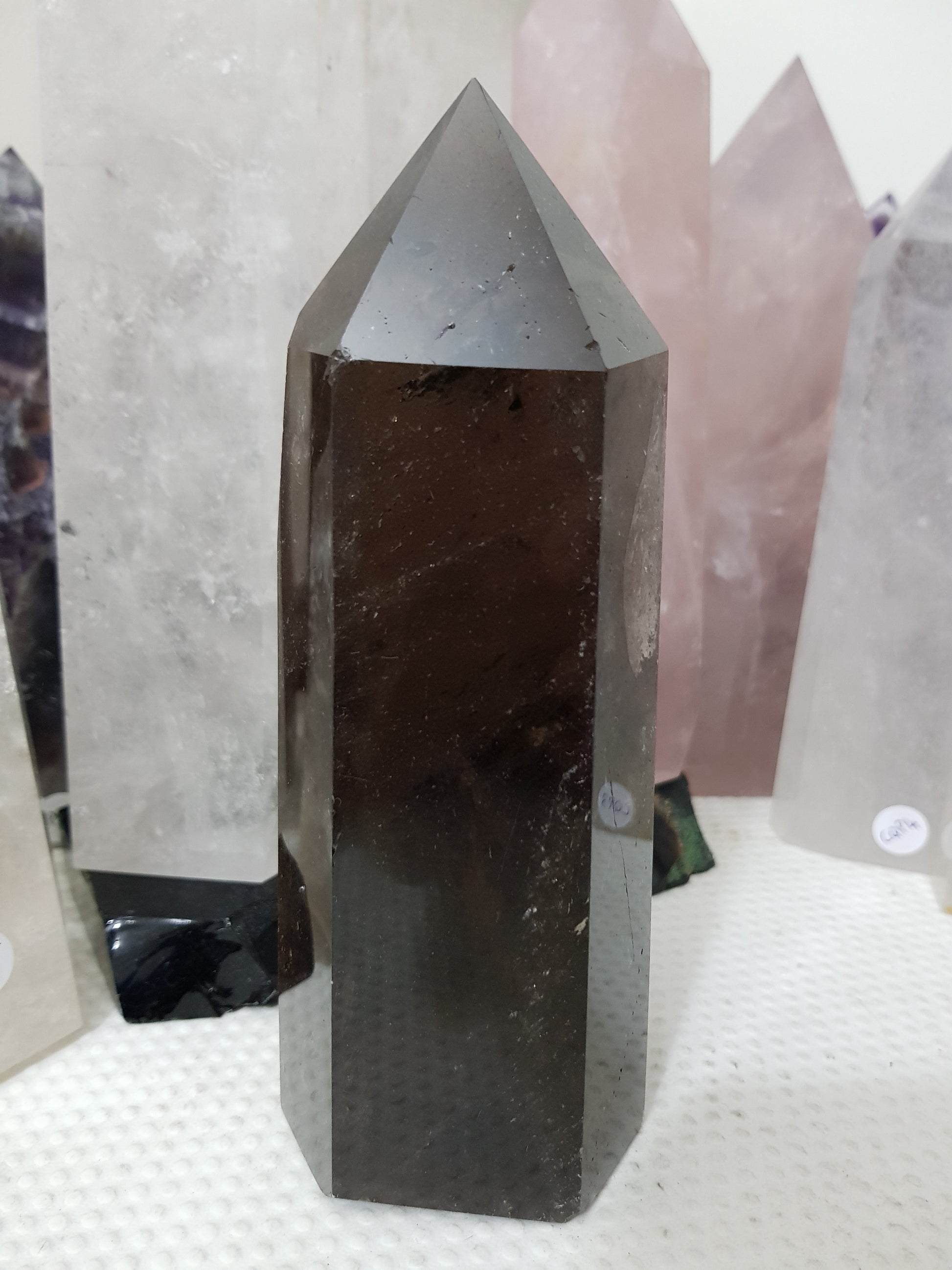 Polished Brazilian Smoky Quartz crystal point tower. Smoky brown standing crystal point 17.5cm