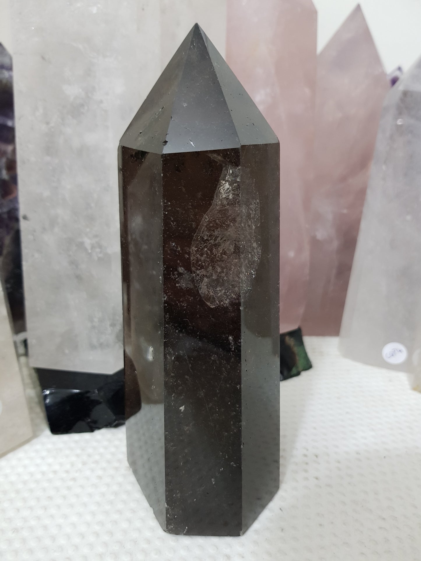 Polished Brazilian Smoky Quartz crystal point tower. Smoky brown standing crystal point 17.5cm