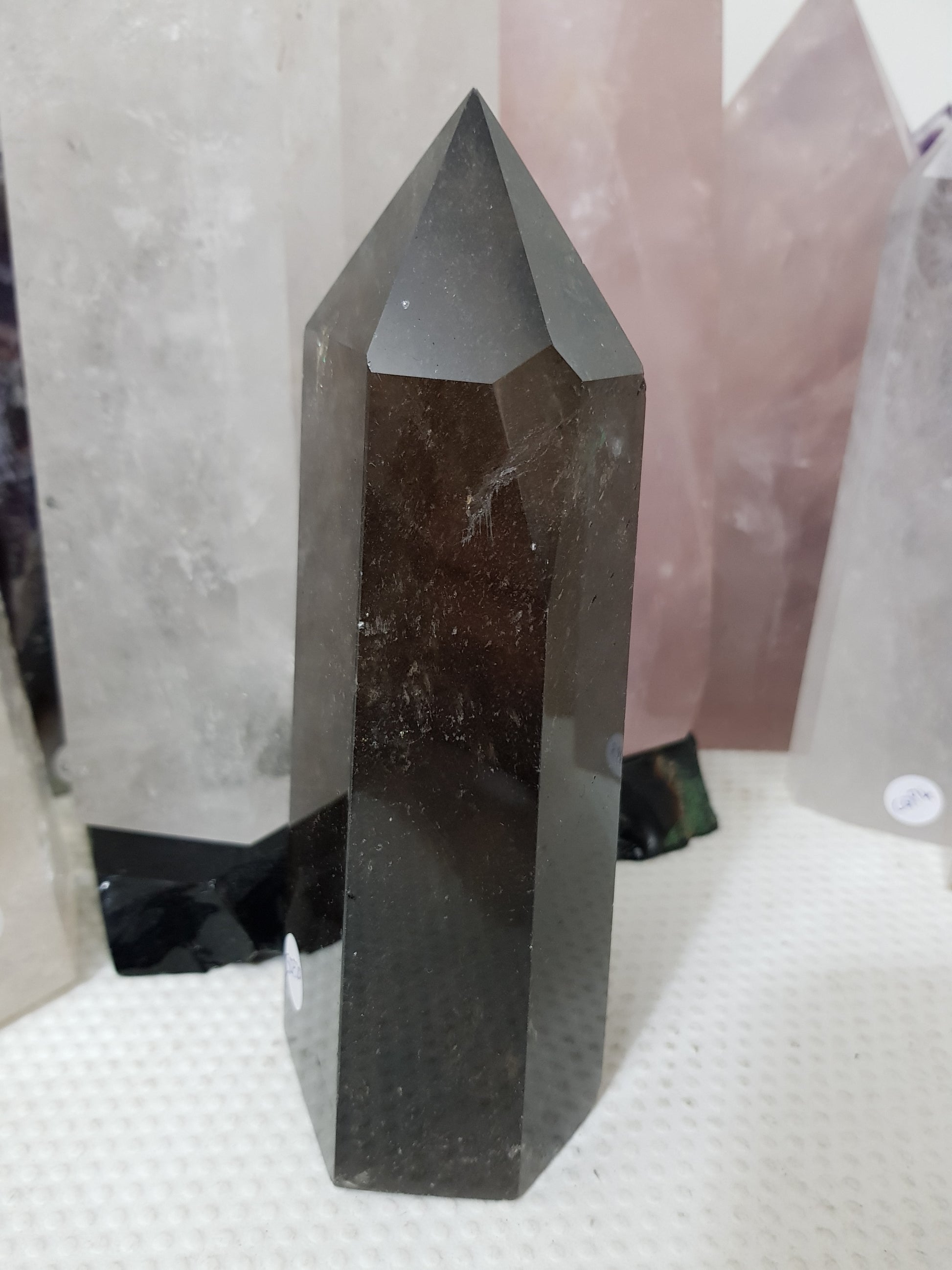Polished Brazilian Smoky Quartz crystal point tower. Smoky brown standing crystal point 17.5cm