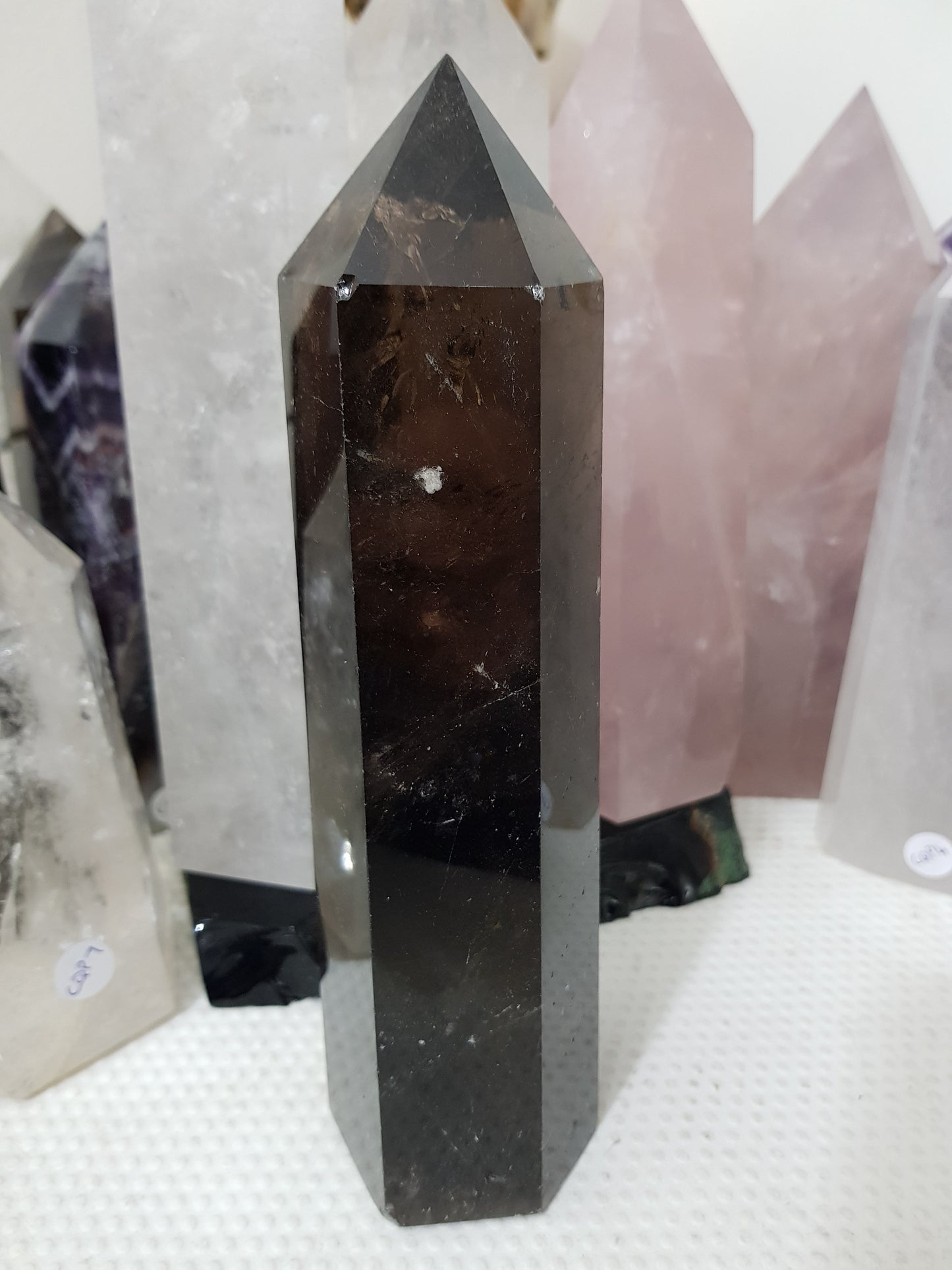 Polished Brazilian Smoky Quartz crystal point tower. Smoky brown standing crystal point 21cm