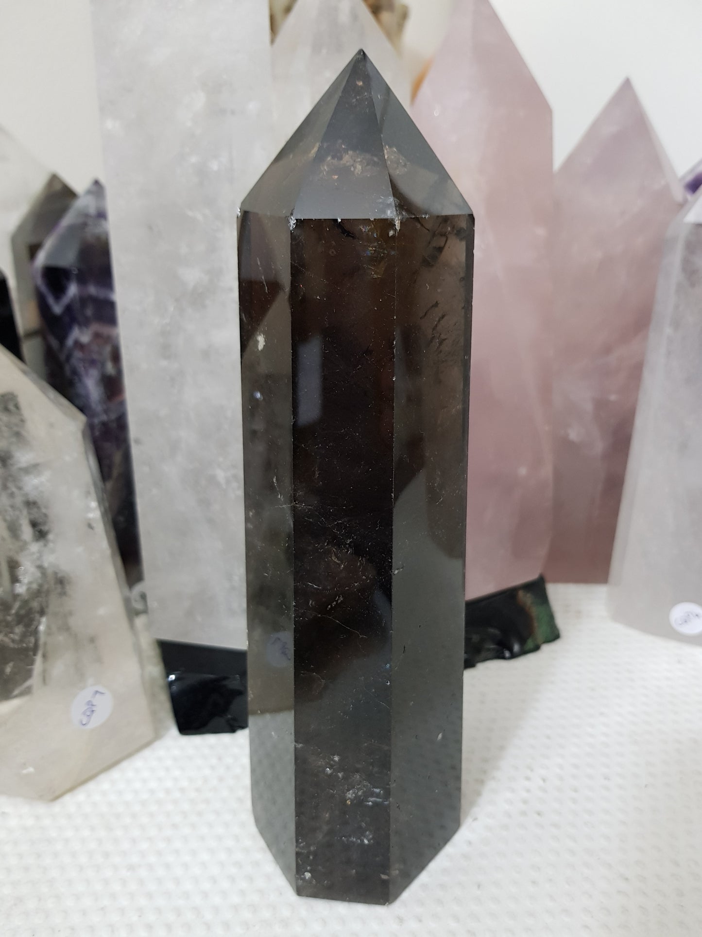 Polished Brazilian Smoky Quartz crystal point tower. Smoky brown standing crystal point 21cm