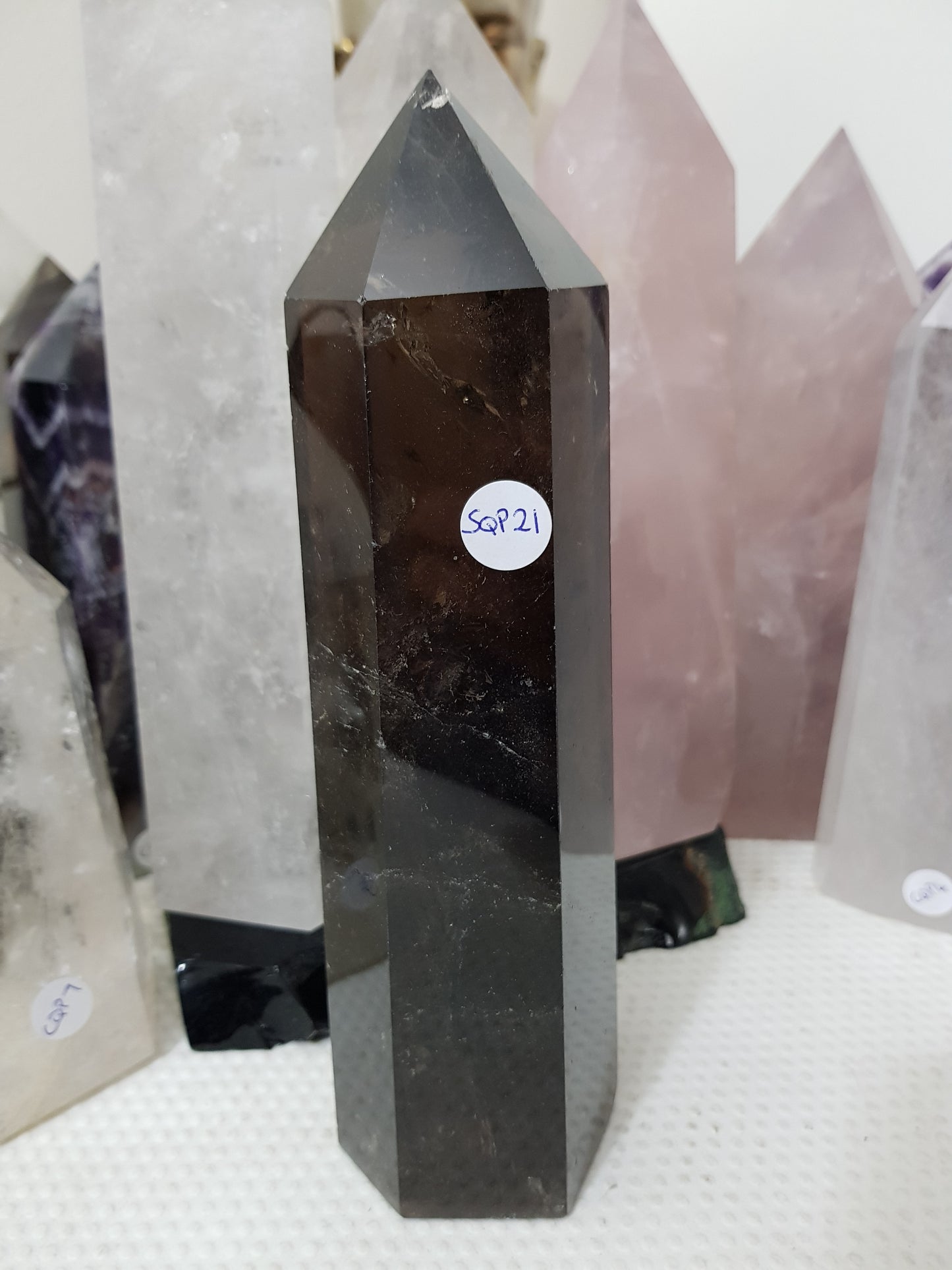 Polished Brazilian Smoky Quartz crystal point tower. Smoky brown standing crystal point 21cm
