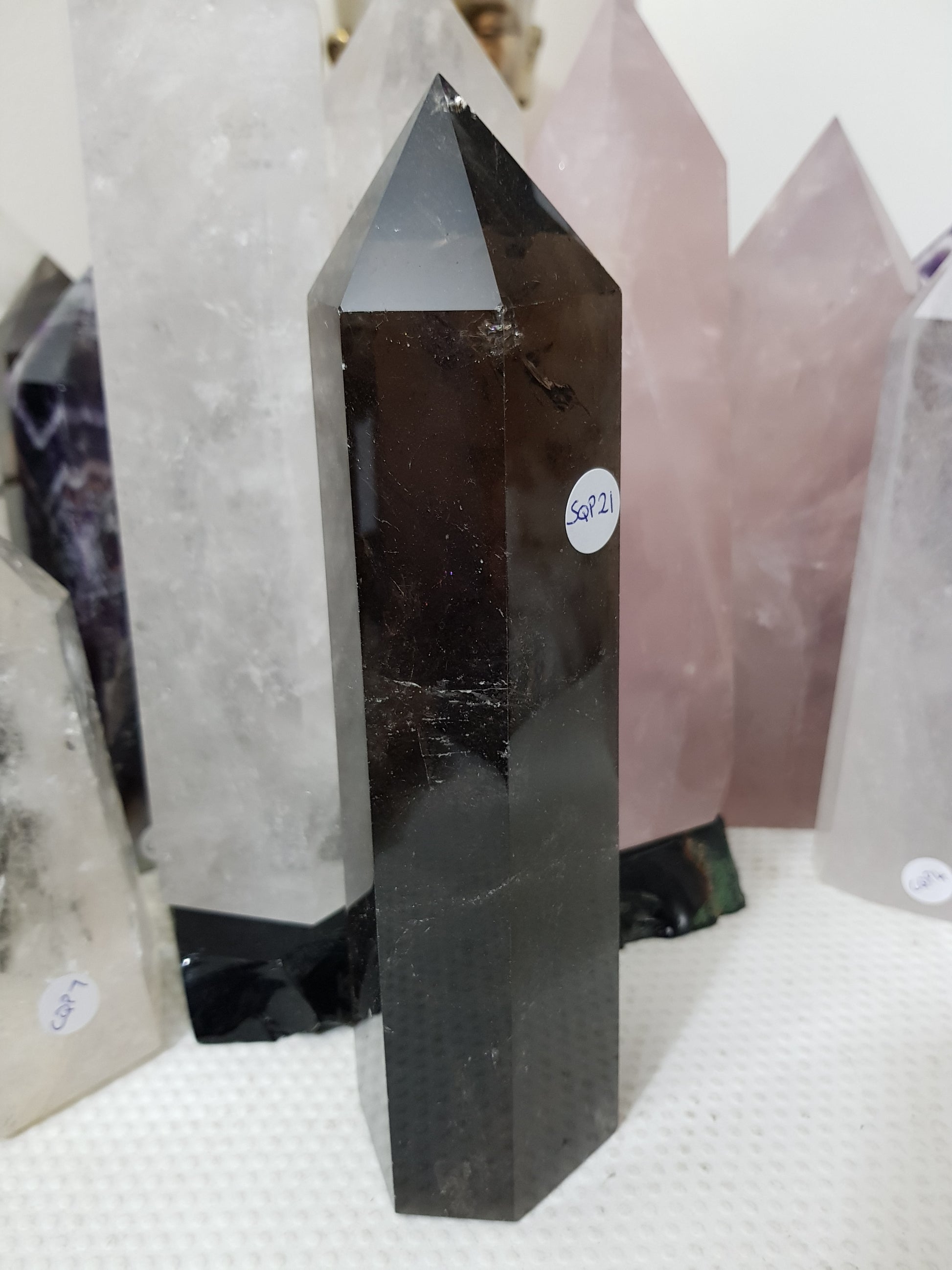 Polished Brazilian Smoky Quartz crystal point tower. Smoky brown standing crystal point 21cm