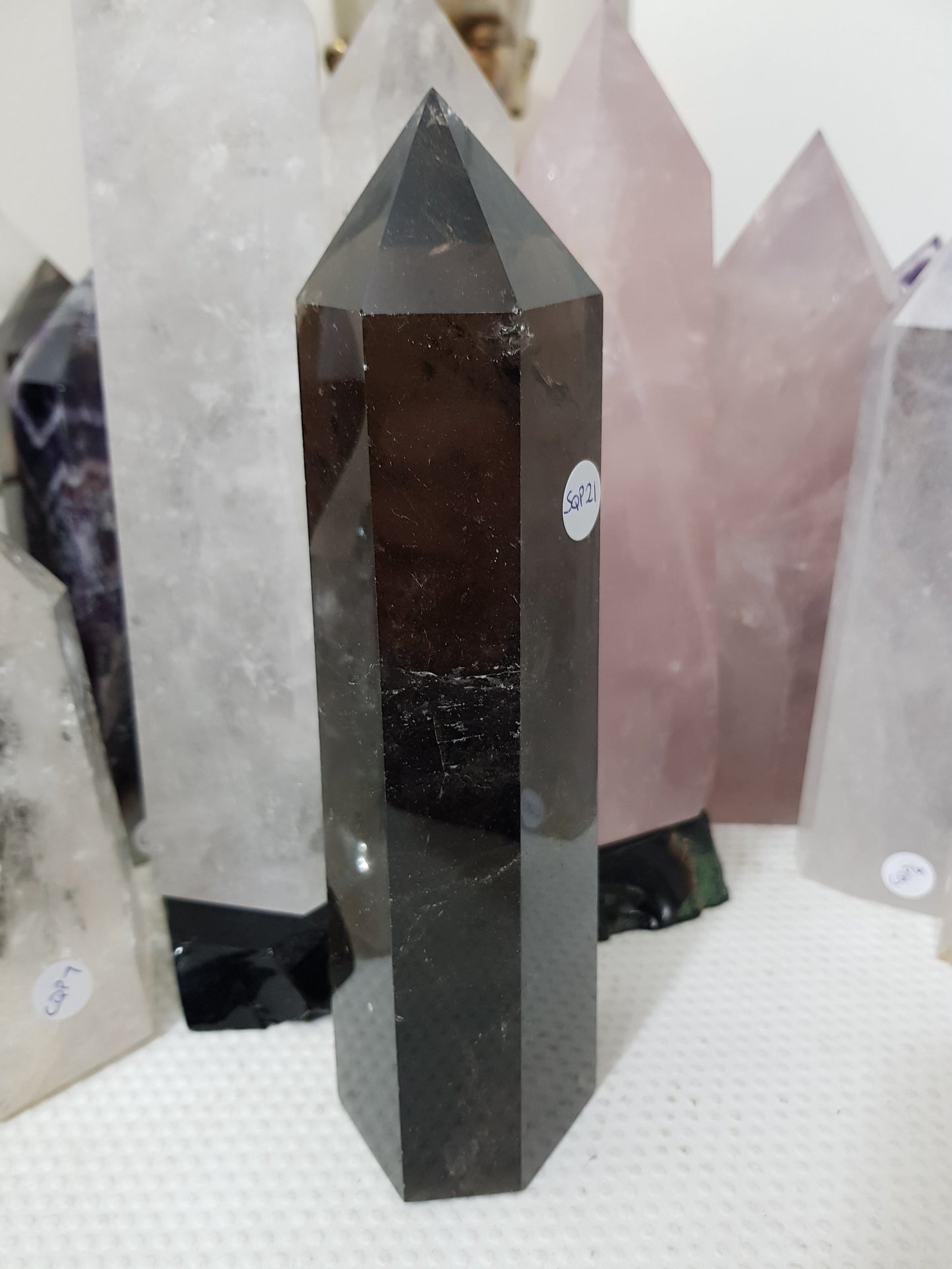 Polished Brazilian Smoky Quartz crystal point tower. Smoky brown standing crystal point 21cm