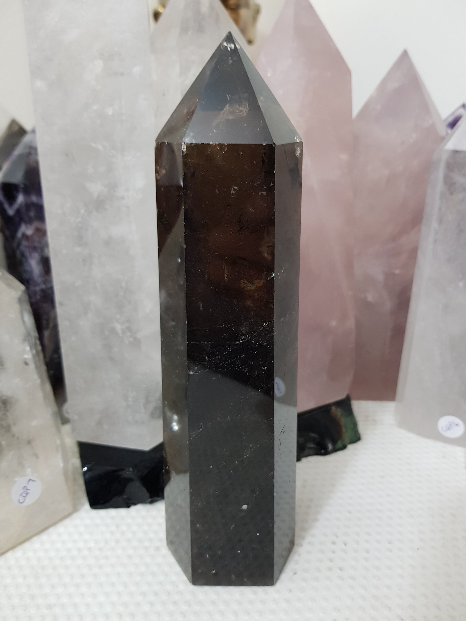 Polished Brazilian Smoky Quartz crystal point tower. Smoky brown standing crystal point 21cm