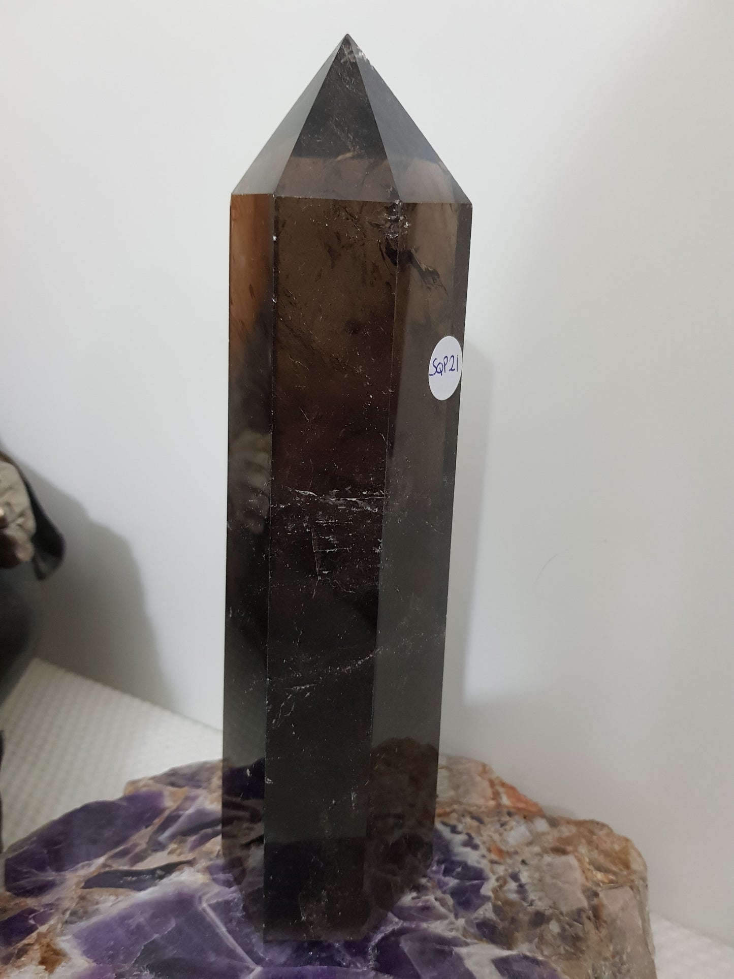 Polished Brazilian Smoky Quartz crystal point tower. Smoky brown standing crystal point 21cm