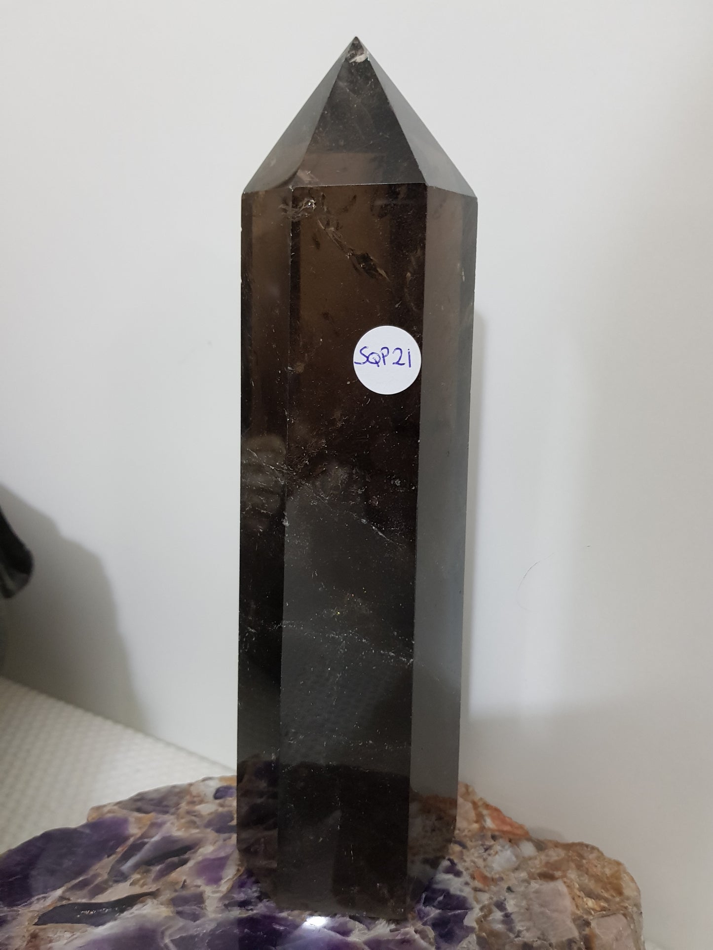 Polished Brazilian Smoky Quartz crystal point tower. Smoky brown standing crystal point 21cm