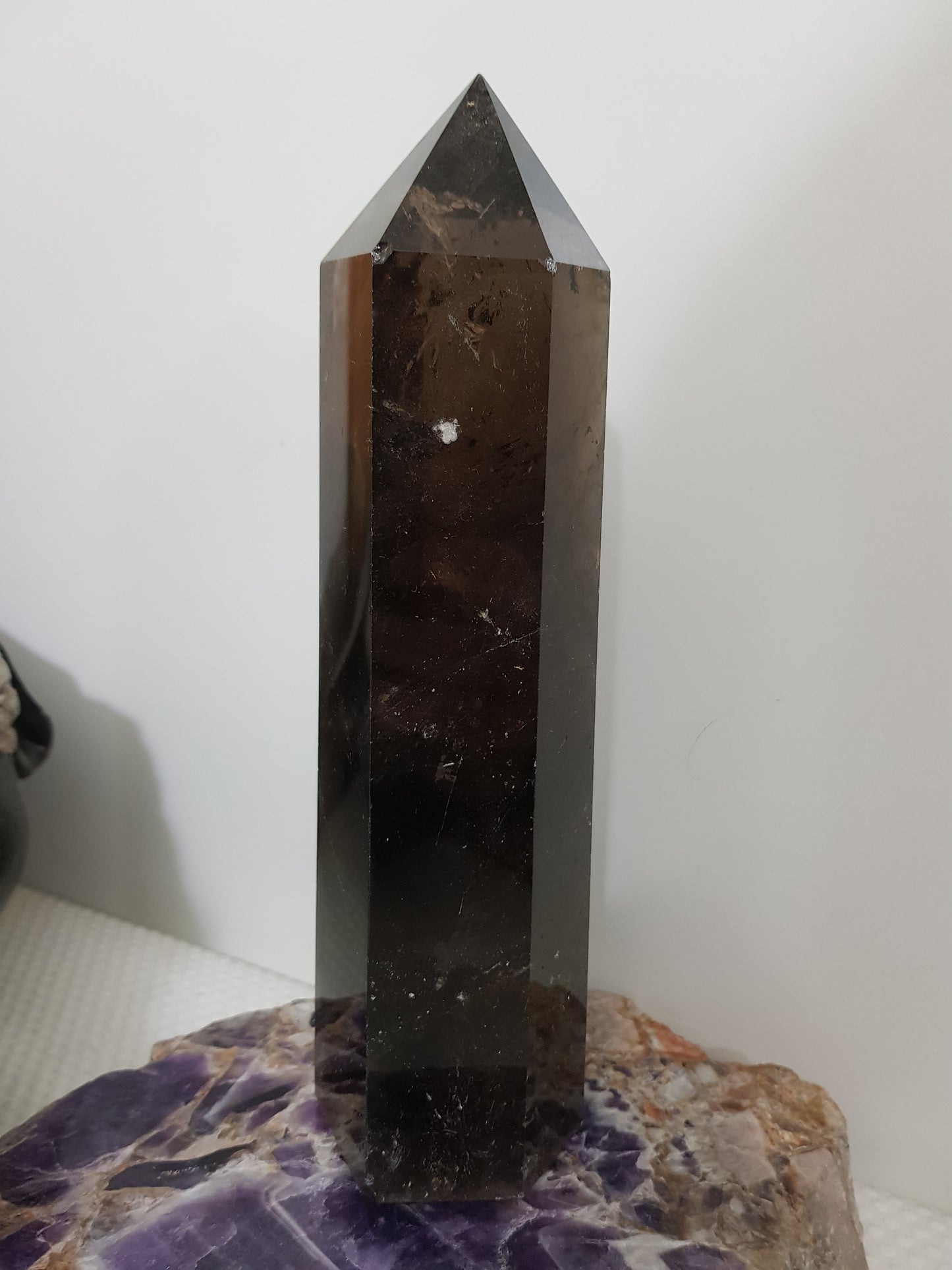 Polished Brazilian Smoky Quartz crystal point tower. Smoky brown standing crystal point 21cm