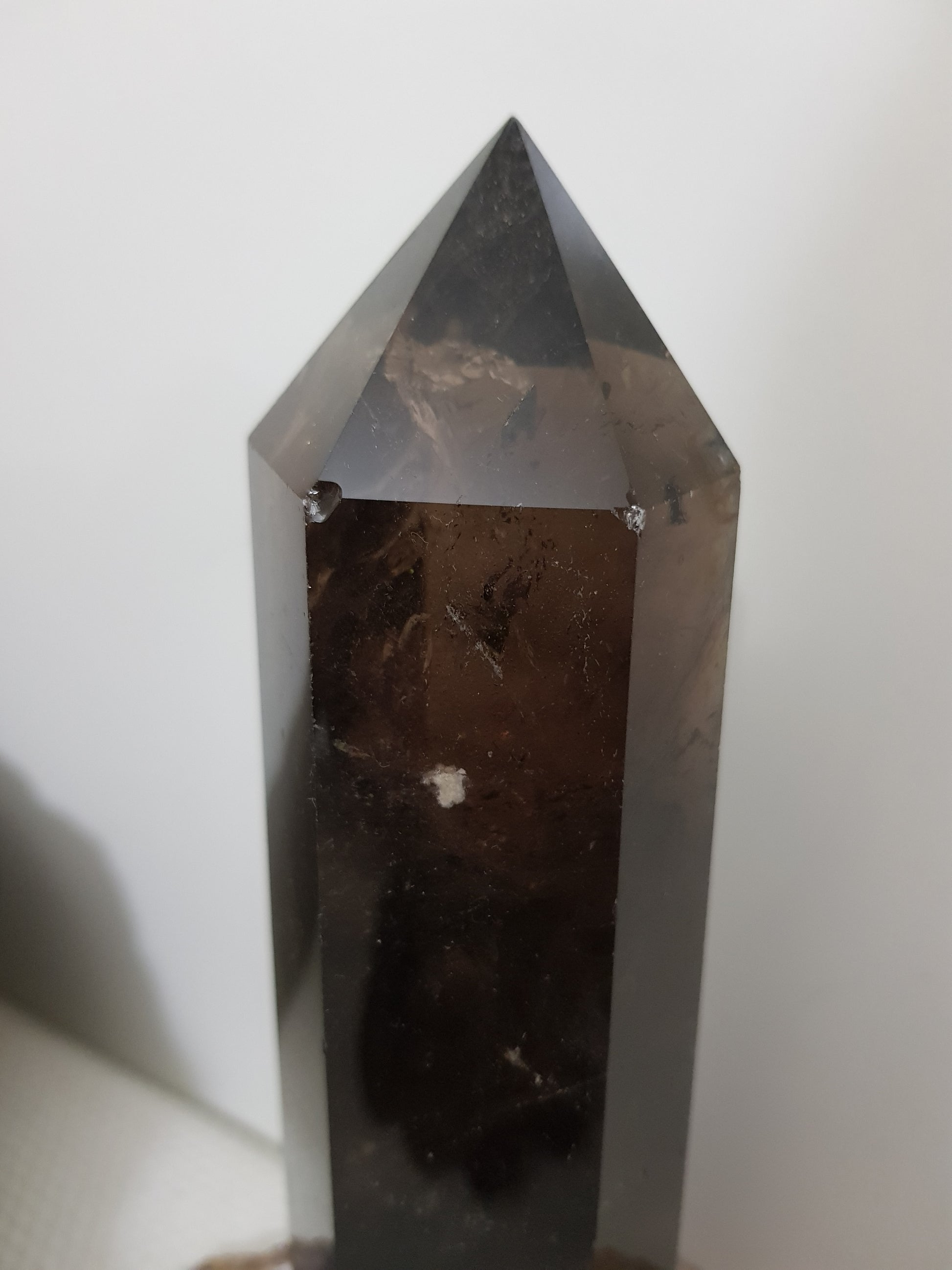 Polished Brazilian Smoky Quartz crystal point tower. Smoky brown standing crystal point 21cm