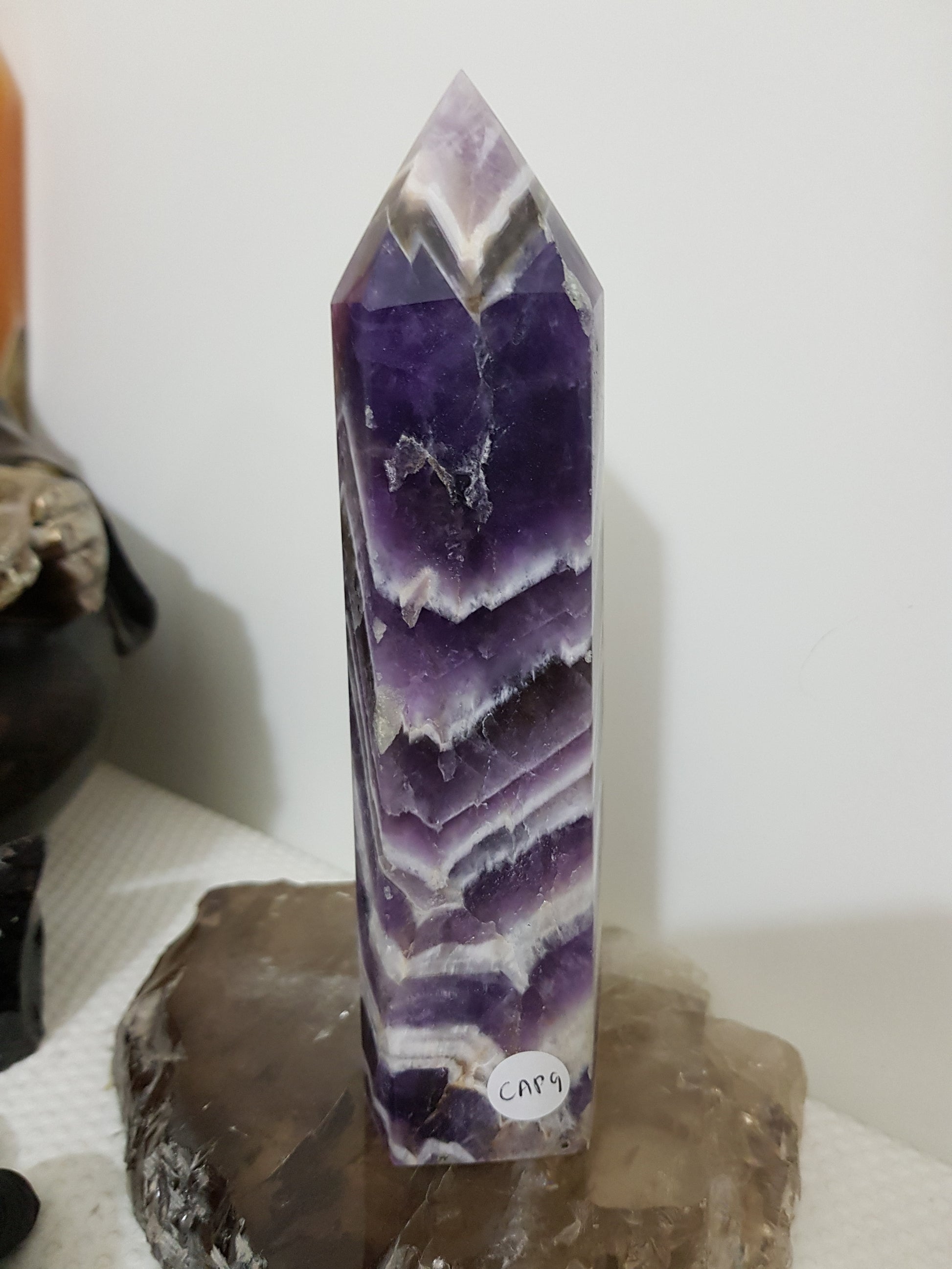 Chevron amethyst crystal point tower polished Brazil deep purple chevron banding 17cm