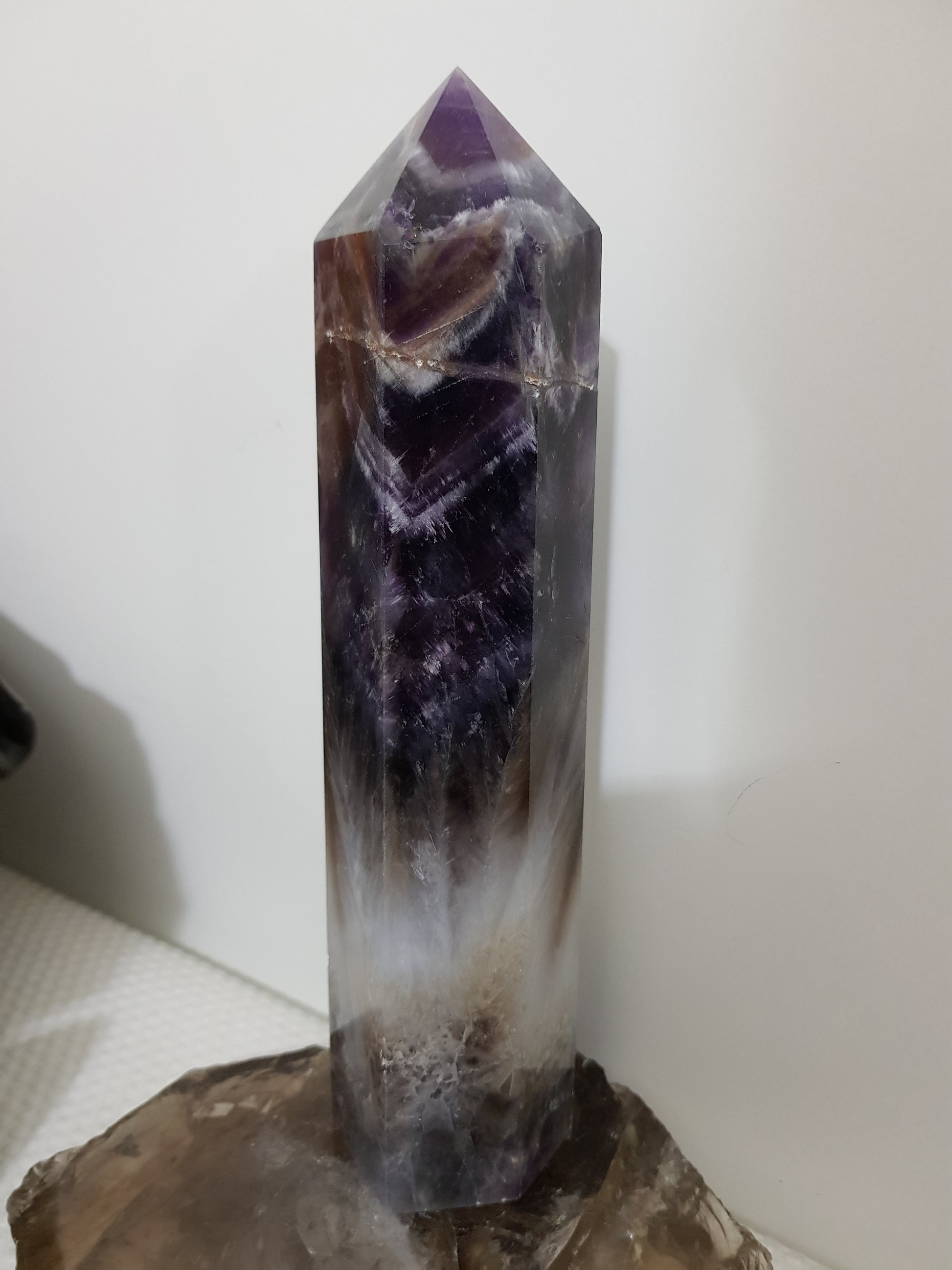 Chevron amethyst crystal point tower polished Brazil deep purple chevron banding 20.5cm
