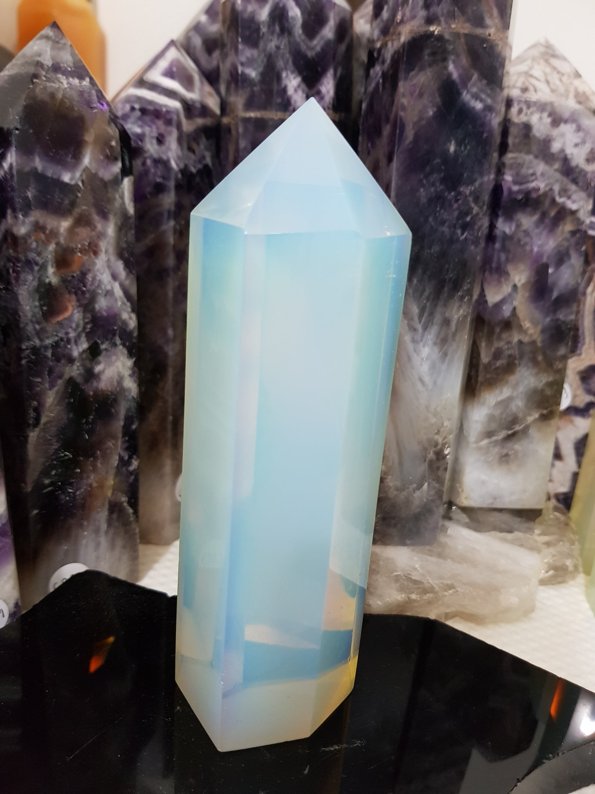 Opalite crystal point tower polished milky blue glow 14cm